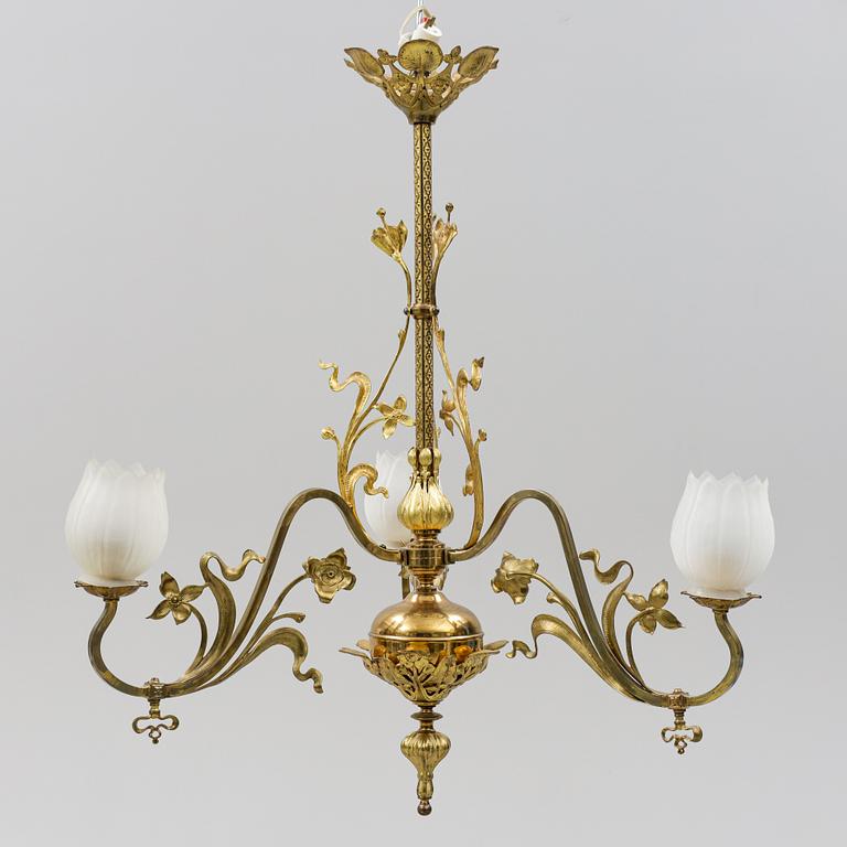 A brass art noveau ceiling lamp, early 20th Century.