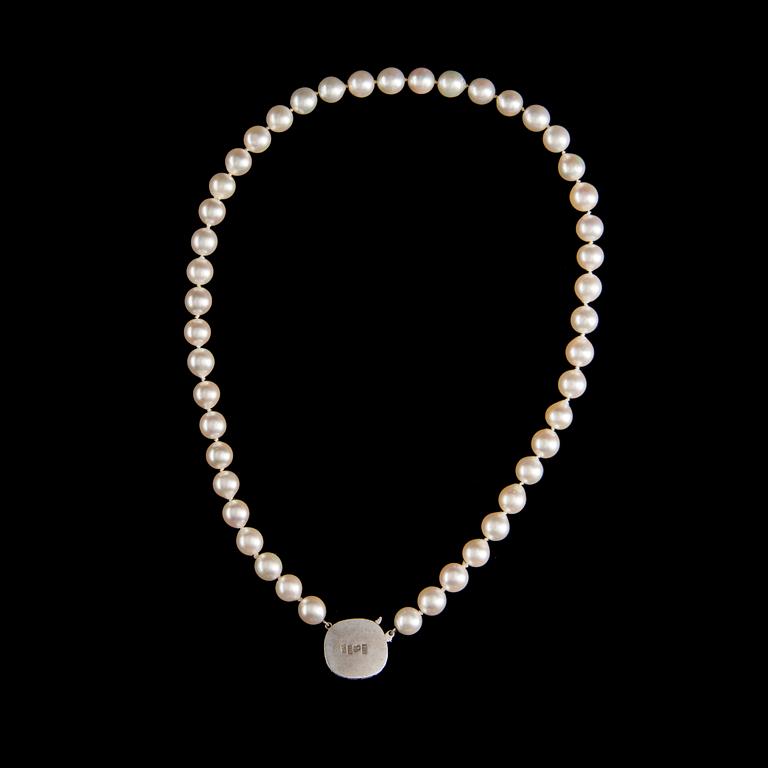 PÄRLCOLLIER, lås 18K vitguld, smaragd och diamanter. Bo Almen Guldateljé, Stockholm 1996.