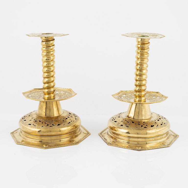 A pair of 19th century Baroque style brass candel sticks.