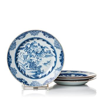 599. A set of four blue and white plates, Qing dynasty, Qianlong (1736-95).