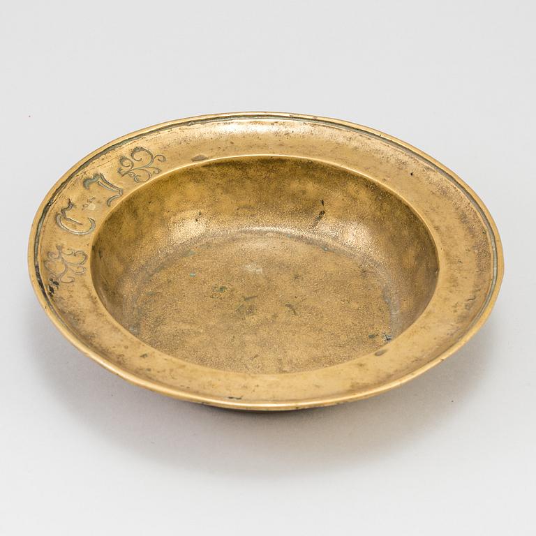 A 17th century bronze bowl.