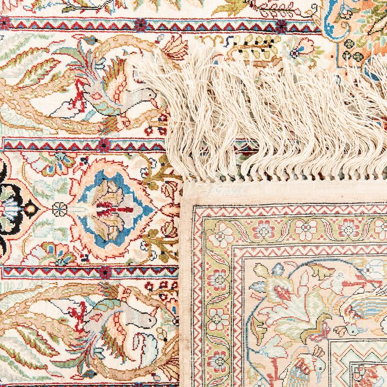 Oriental silk rug, approximately 153x93 cm.
