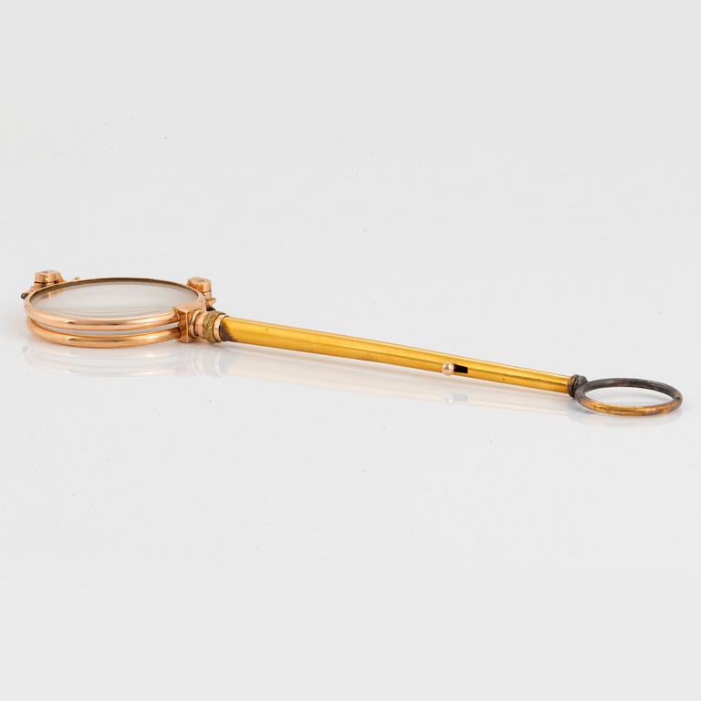 A 14K gold lorgnette.