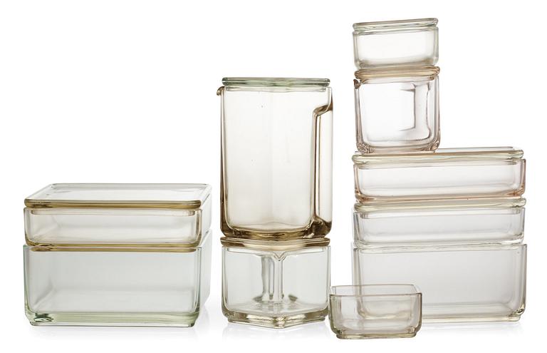A Wilhelm Wagenfeld set of ten 'Kubus' stackable storage glass containers, Vereinigte Lausitzer Glaswerke AG, ca 1938.