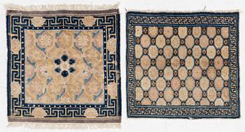 Two antique Ningxia meditation rugs, Qing dynasty, 19th century. c. 67 x 72 and 71 x 73 cm.