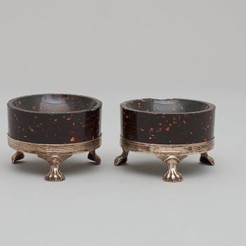 A pair of late Gustavian porphyry and silver salts. Silver maker's mark by Adam Tillström, Växjö 1799.