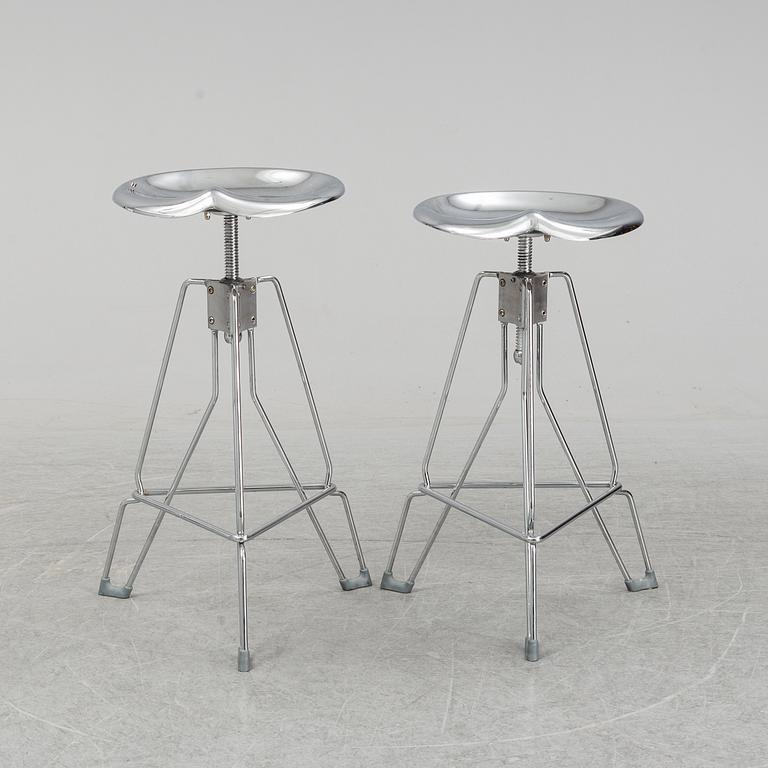 A pair of 'Dulton stools' by Yasu Sasamoto.