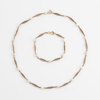 Bracelet and necklace, low fineness gold and pearls.
