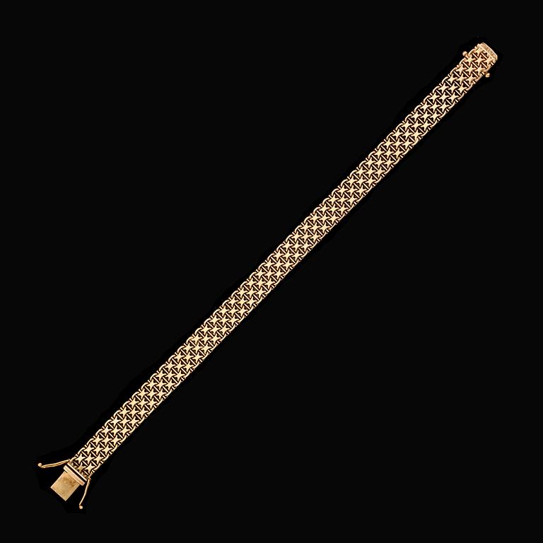 ARMBAND, 18 k guld, x-länk, svenska stämplar 1967. Vikt ca 18 gram.