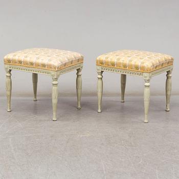 A pair of late gustavian stools, ca 1800.