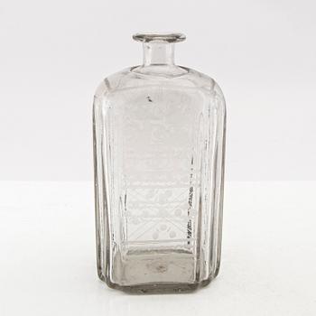 Flaska, glas. Troligen Skånska glasbruket, 1700-tal.