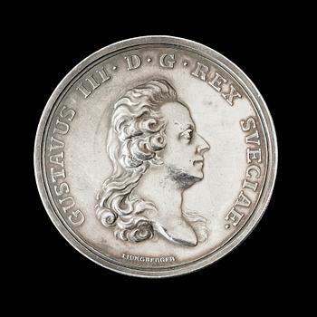MEDALJ. Gustav III:s karusell/tornering på Drottningholm 1785. Utförd av G. Liungberger/C.G. Fehrman. Silver 4,2 cm 29 g.