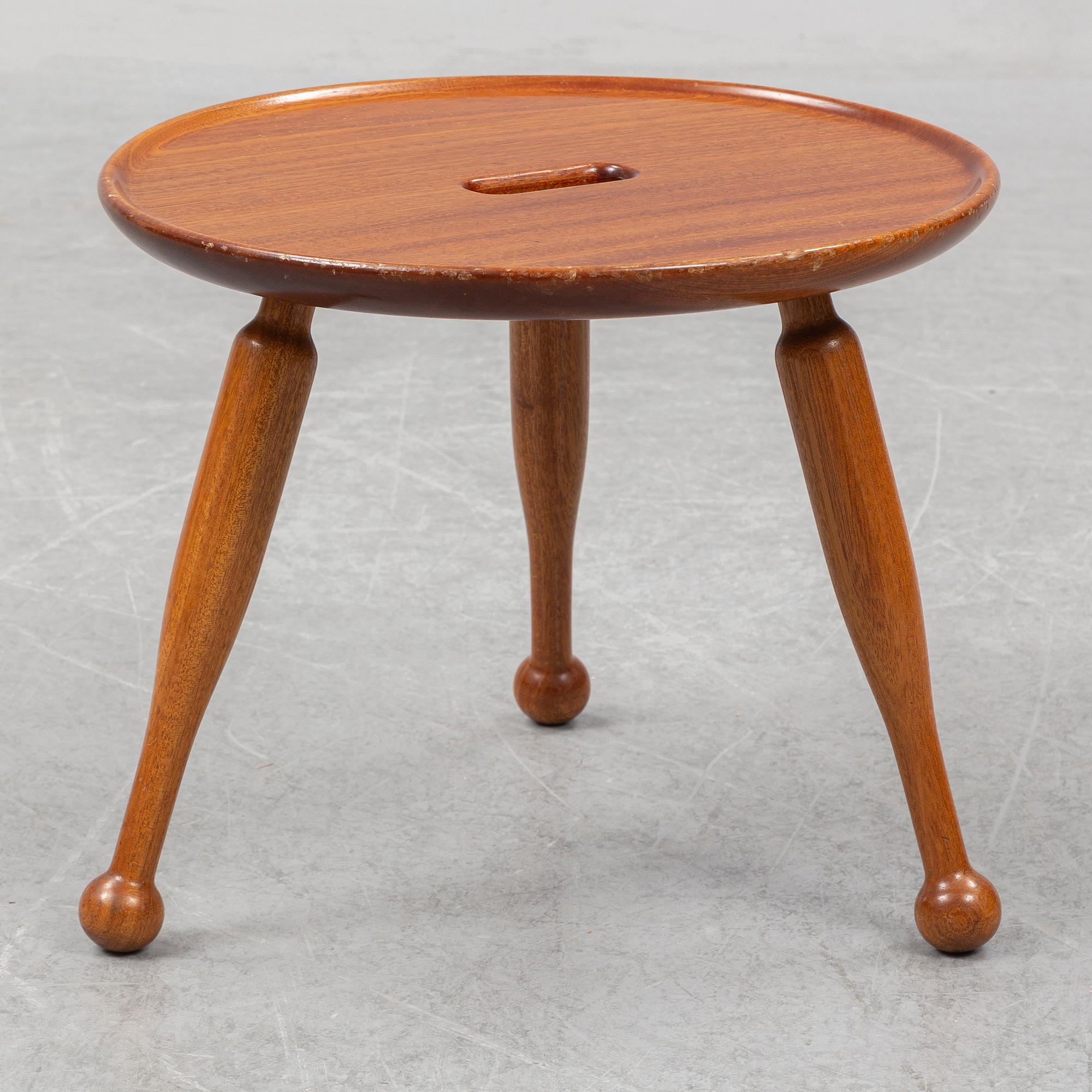 A mahogny stool, model 2156, by Josef Frank for Firma Svenskt Tenn.