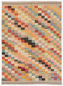 A Kelim carpet, c. 253 x 182 cm.