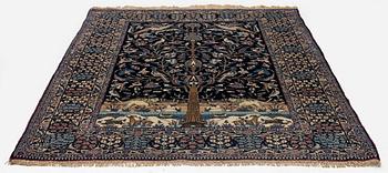 An antique pictoral Tehran rug, North Persia, c. 202 x 138 cm.