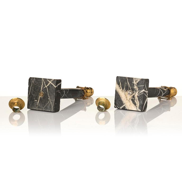 A pair of Gustavian black marble candlesticks.