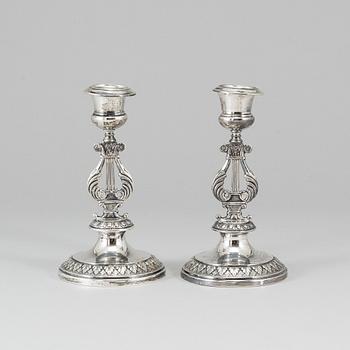 A pair of silver candlesticks by GAB, Stockholm, 1909.