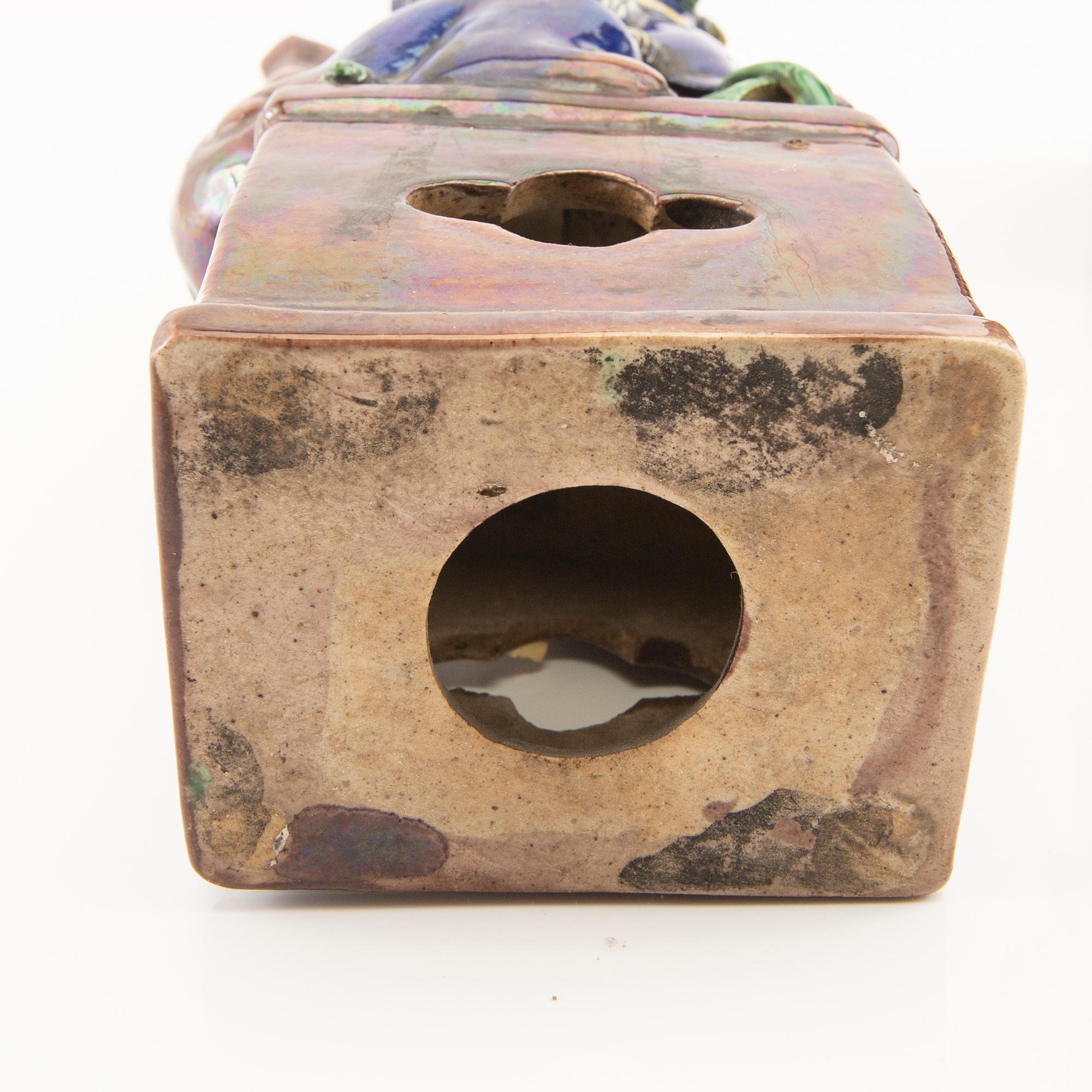 A pair of Chinese Joss stick holders, late Qing dynasty/early 20th Century.