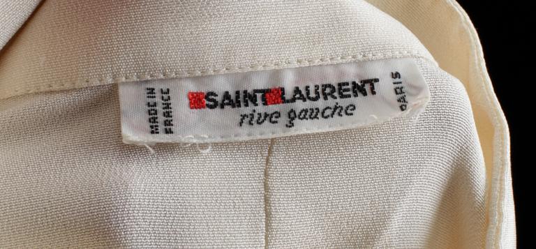 A set of two silk blouses by Yves Saint Laurent.