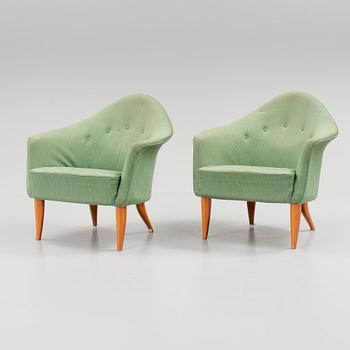 A pair of "Lilla Adam" armchairs by Kerstin Hörlin-Holmquist för Nordiska Kompaniet.