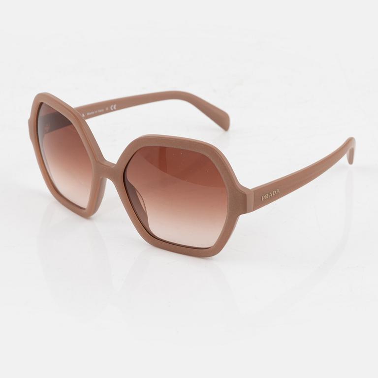 Prada, a pair of coral pink sunglasses.