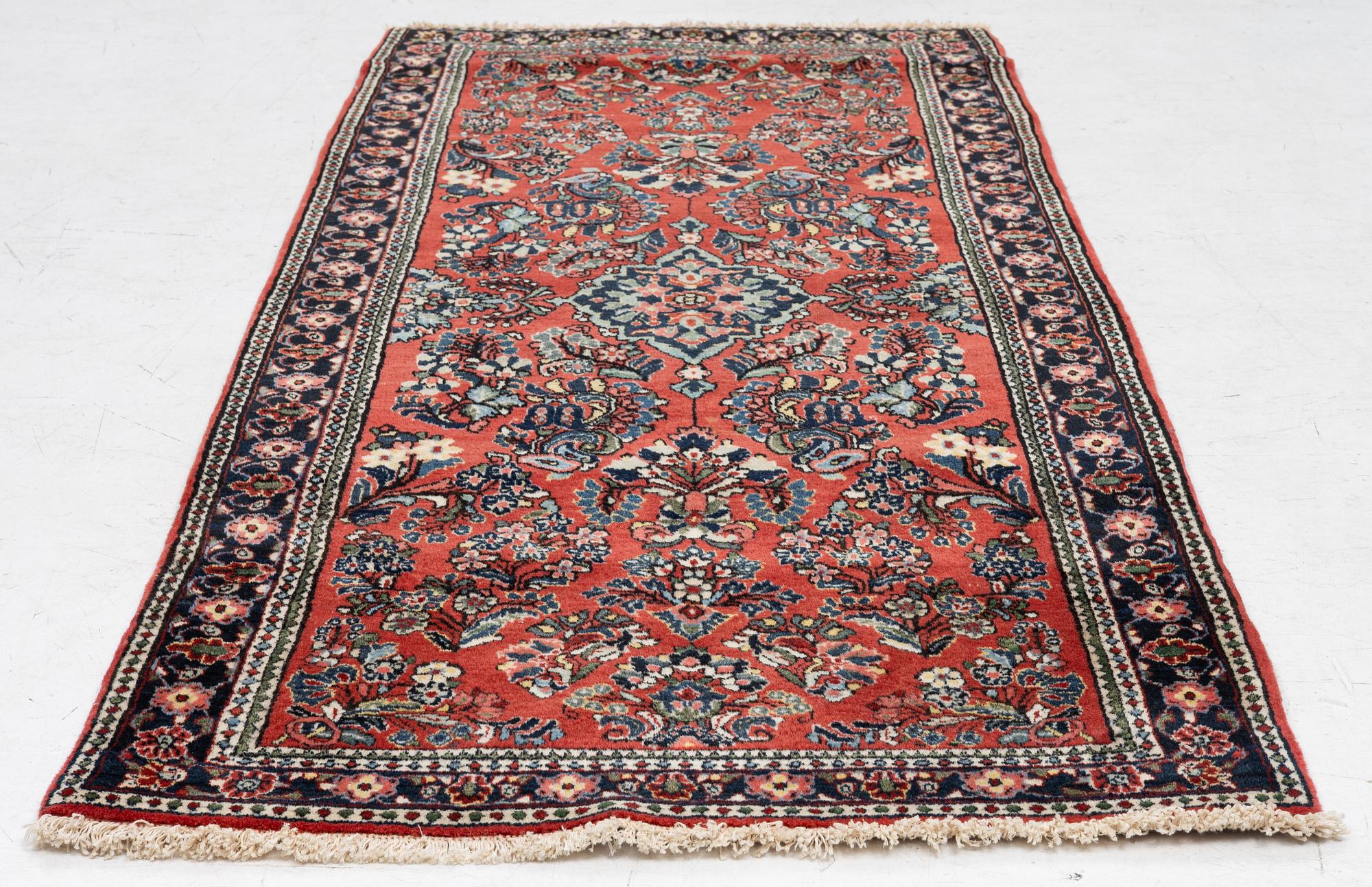 An Old Sarou runner, c. 193 x 84 cm.