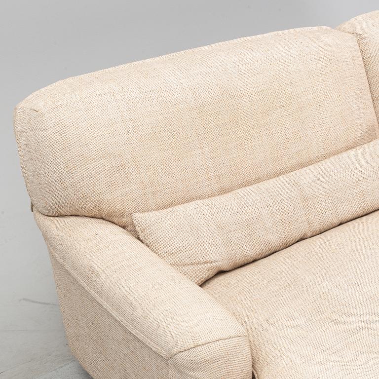 A 'Raffles' sofa designed by Vico Magistretti in 1988 for DePadova.