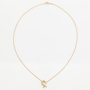 Tiffany & Co, Paloma Picasso, an 18K gold "Loving Heart" necklace.