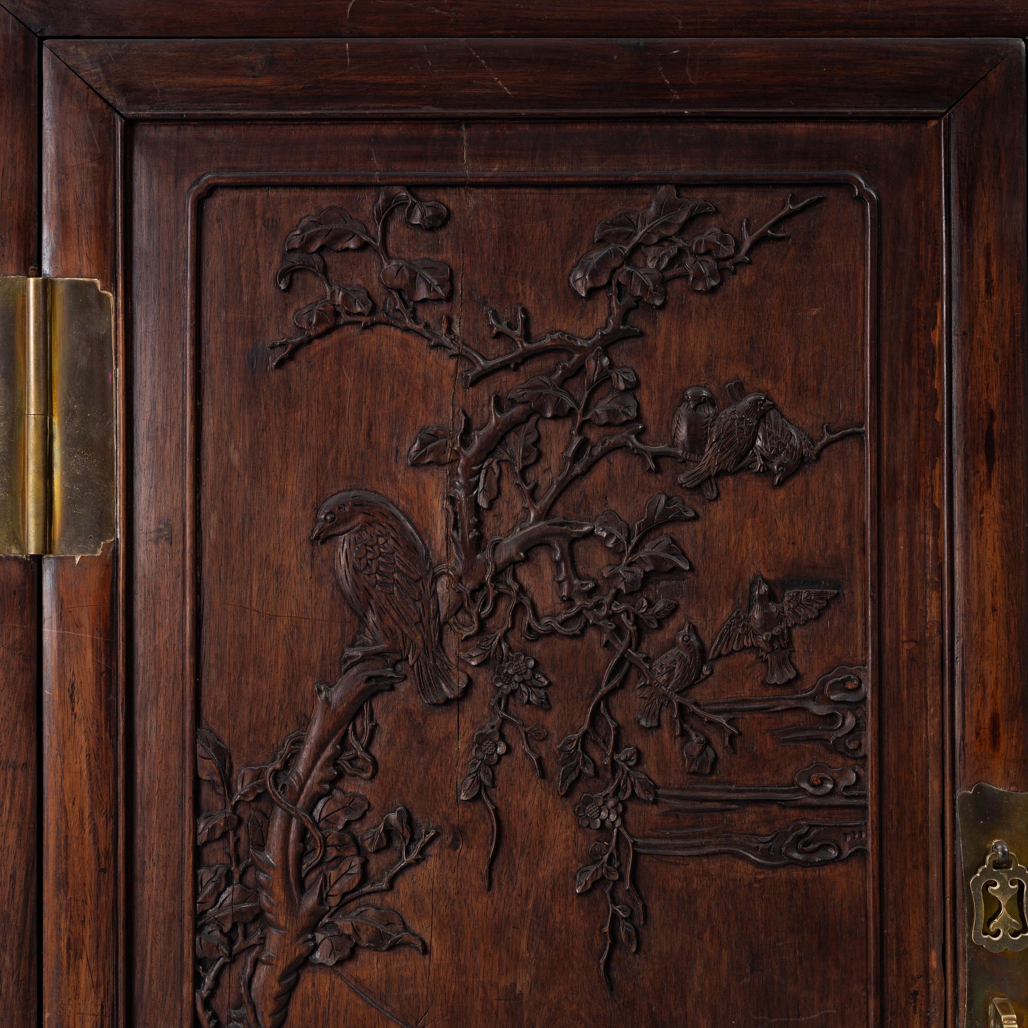 A hardwood cabinet, China, 20th century.