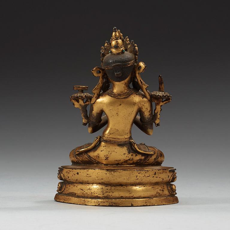 A gilt copper alloy figure of Manjushri, Nepal 15th/16th Century.