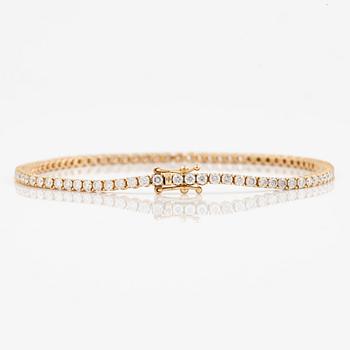 Tennisarmband 18K guld med briljantslipade diamanter.