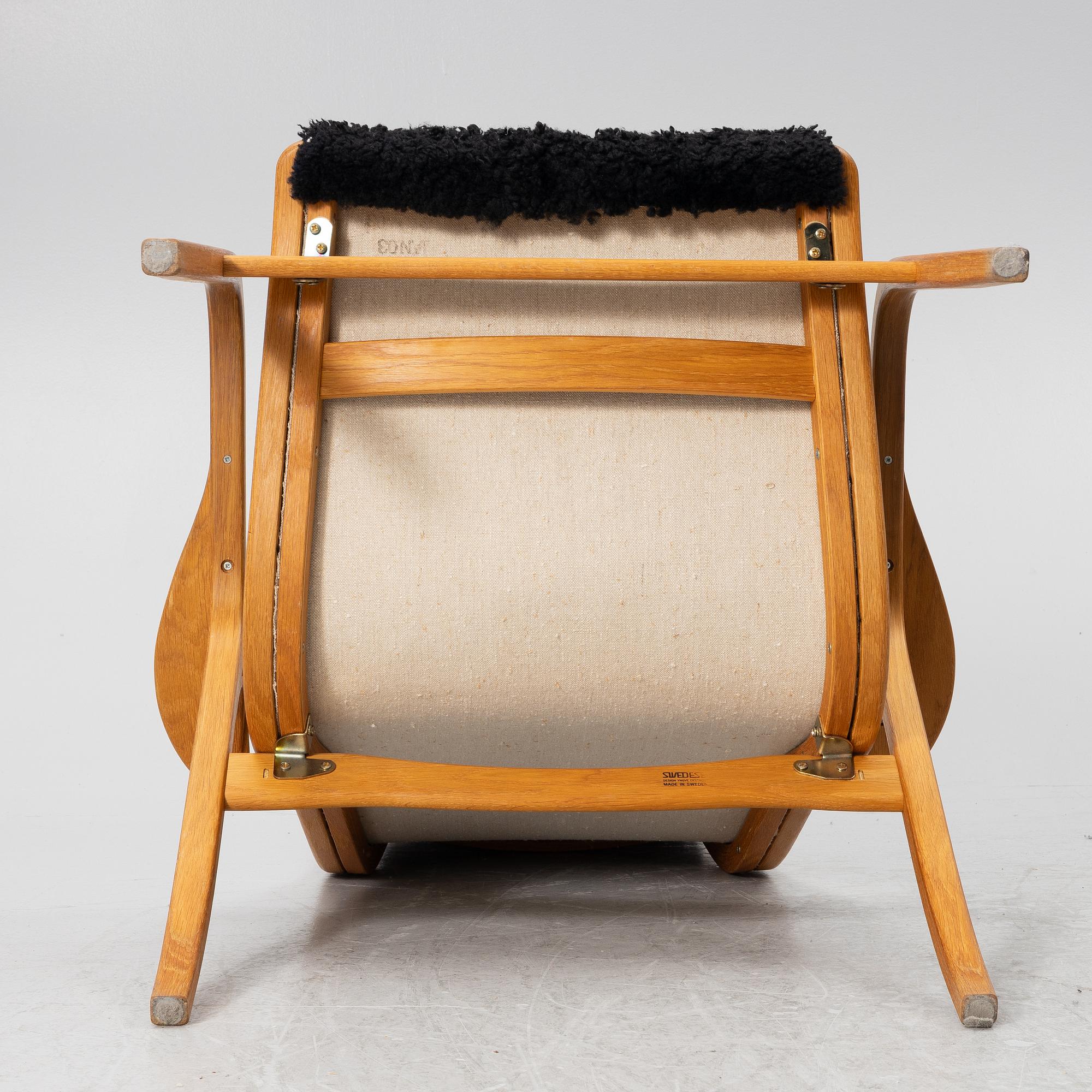 Yngve Ekström, a 'Lamino' armchair with ottoman, Swedese.