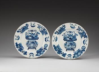 A set of eight odd blue and white dishes, Qing dynasty, Kangxi (1662-1722).