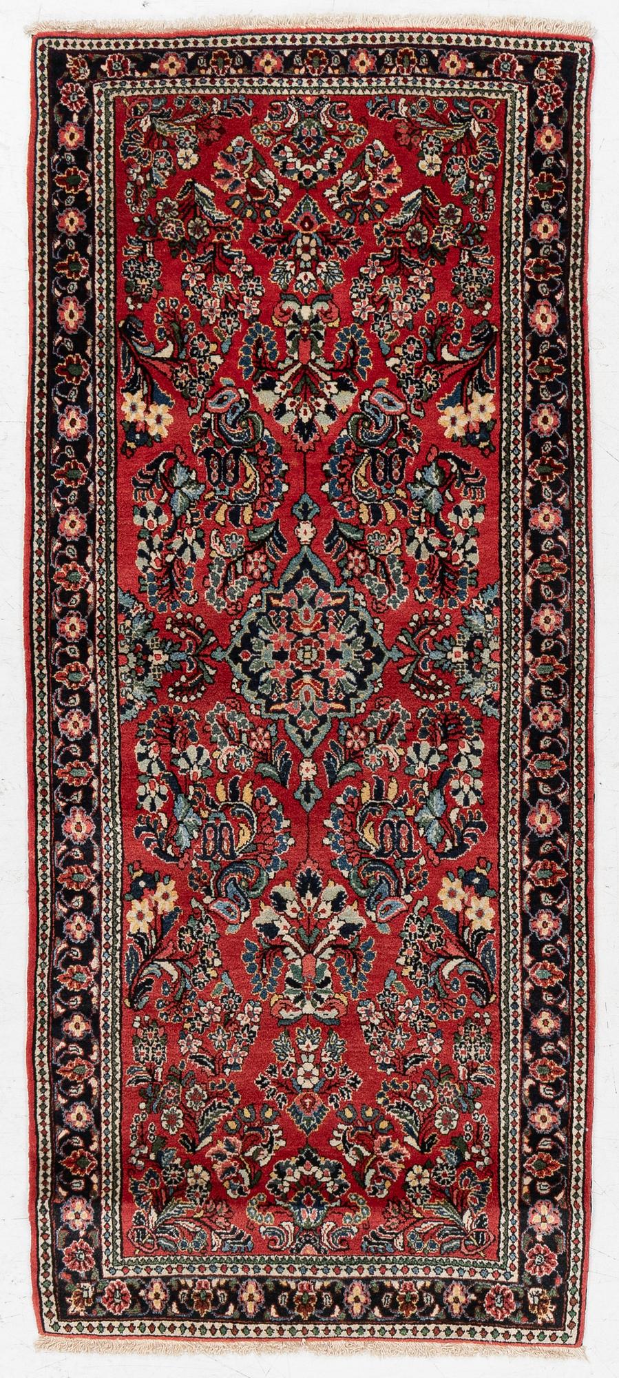An Old Sarou runner, c. 193 x 84 cm.