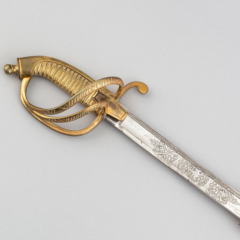 An Imperial Russian gold sabre for Bravery, 1855 naval pattern, Zlatoust factory, with scabbard.