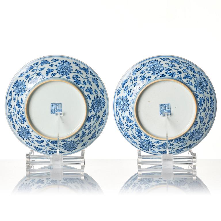 A pair of blue and white lotus dishes, Qing dynasty, Qianlong seal mark and of the period (1736-95).