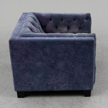 A velvet covered easy chair, 2010.