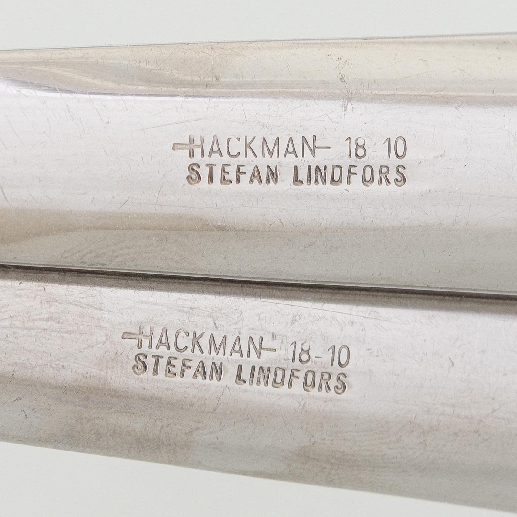 Stefan Lindfors, a stainless steel salad bowl with servers, Hackman, late 20th century.