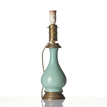 A celadon vase made into a lamp, circa 1900.