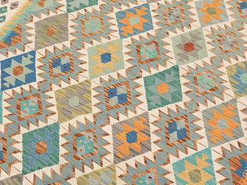 A Kilim rug, approx. 259 x 172 cm.