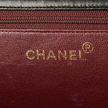 A handbag by Chanel.