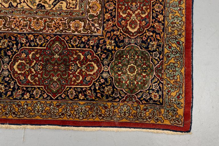 A carpet, semi-antique Tabriz, ca 398 x 290 cm.