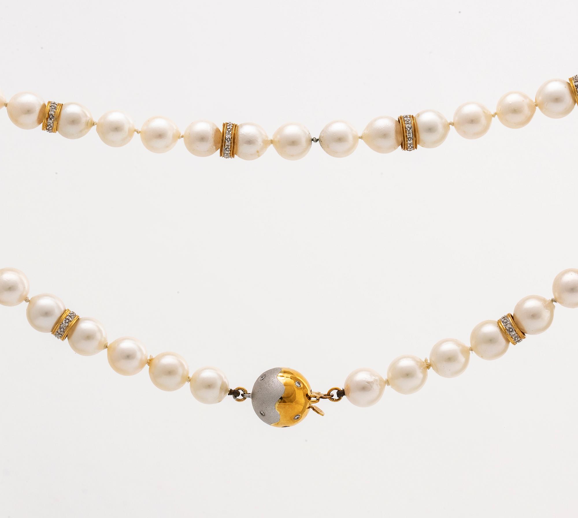 PEARL NECKLACe, cultured pearls 7,5-8 mm, clasp 18K gold diamonds and spacers 18K gold and diamonds 0,60 ct in total.