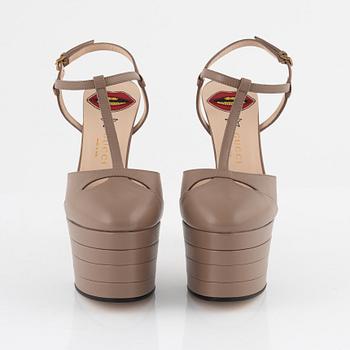 Gucci, a pair of nude leather high heel shoes, 2016, size 37.
