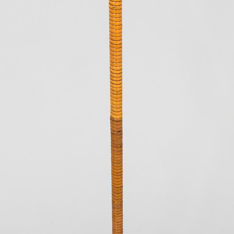 Paavo Tynell, a pair of mid-20th century K10-10 floor lamps for Taito Finland.