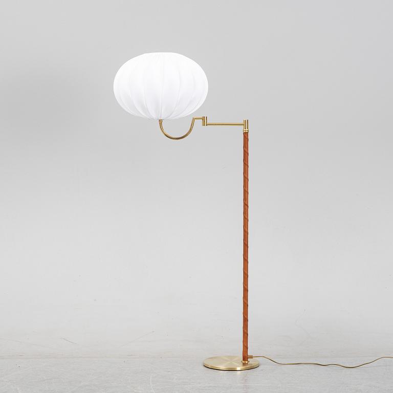 A brass floor light from EWÅ, second half of the 20th Century.