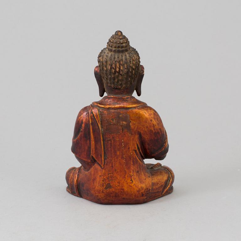 A Japanese carved wooden sculpture, late 19th century.