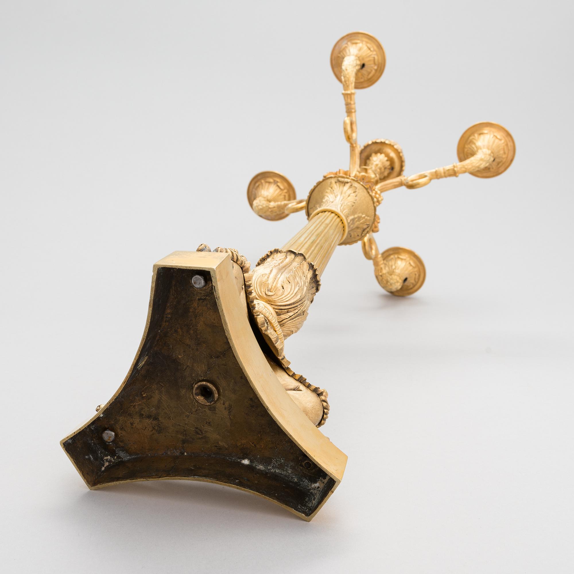A latter half of the 19th-century candelabrum/ table light, altered in the 20th century.