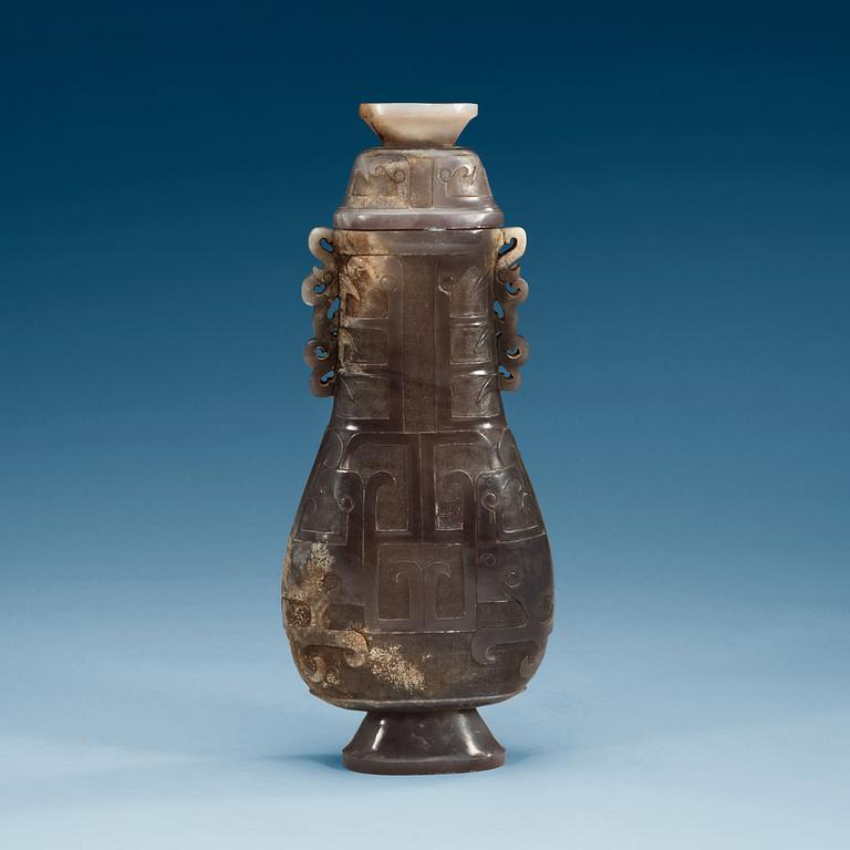 A large archaistic vase with cover, presumably chalcedony, China.