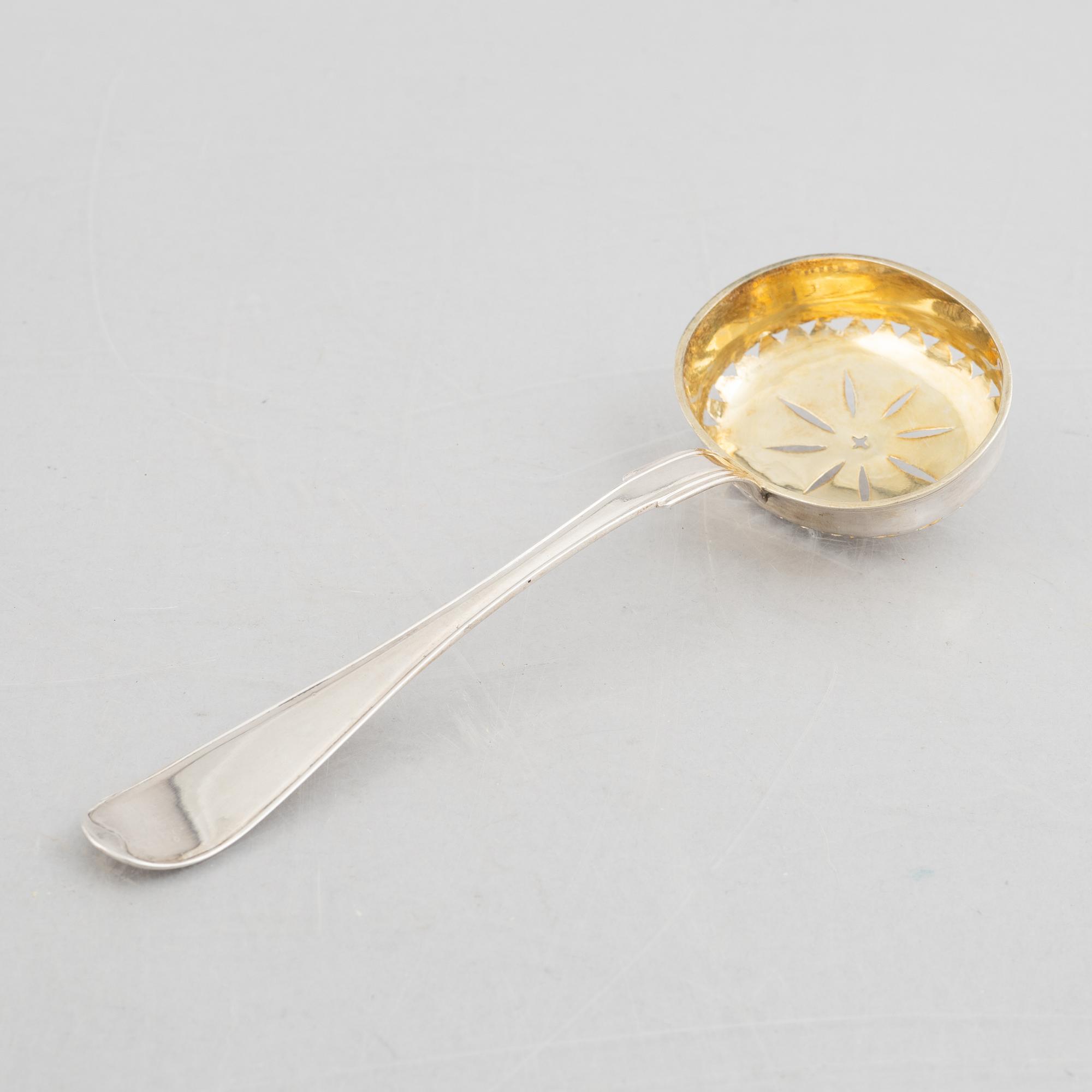 A Swedish Empire silver sugar bowl with sugar spoon, mark of Carl Lindström, Borås 1842.